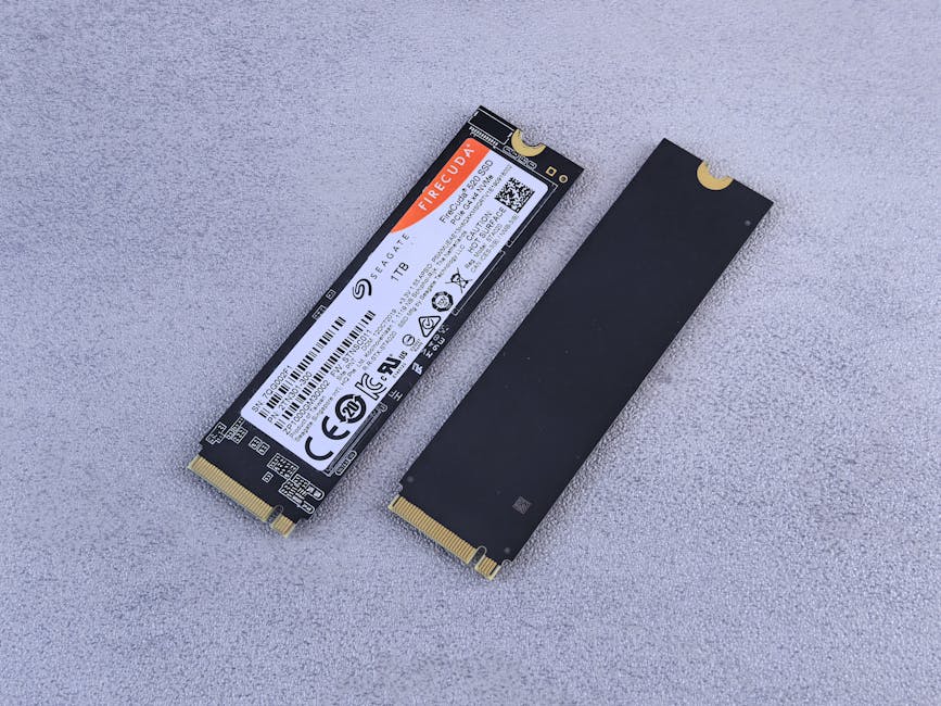 Close-up of an NVMe SSD inside a laptop, highlighting storage speed importance