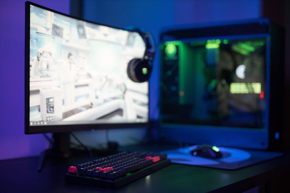 Person reviewing GPU benchmark settings on a PC with FPS chart on monitor