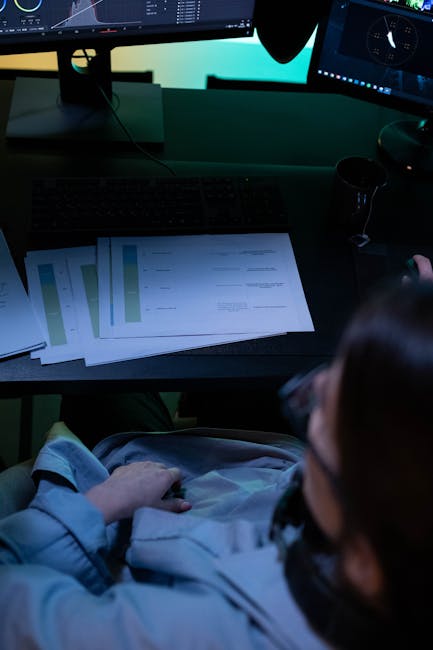 Analyst reviewing suspicious network traffic on a laptop during an investigation