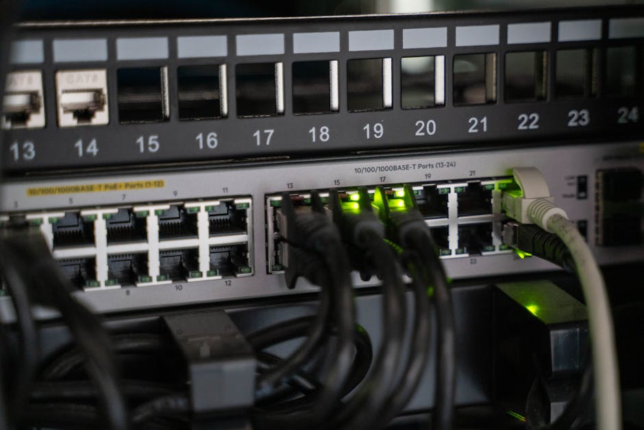 Technician powering down network connections in a server room to contain ransomware