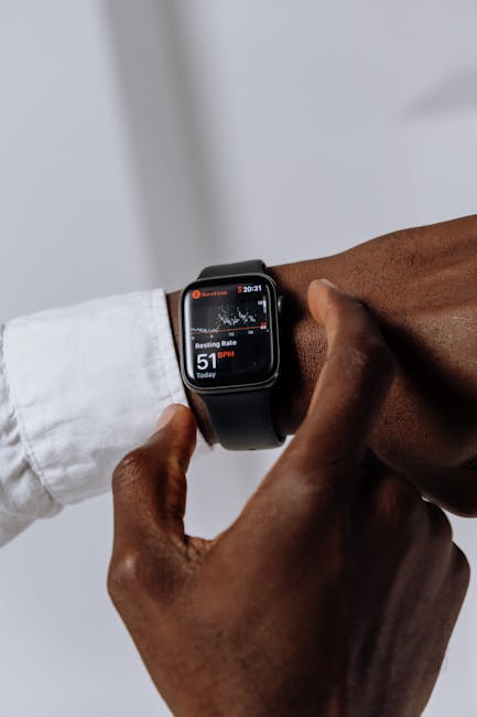 Smartwatch Showdown: Apple Watch vs Samsung Galaxy Watch, fitness and health tracking comparison on Pexels image