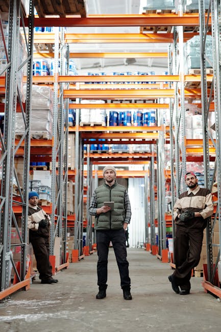IoT sensors and gateways placed across a warehouse aisle showing signal coverage range