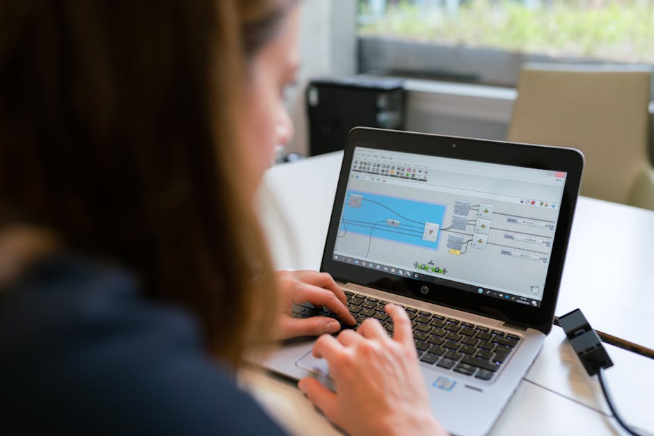 Person viewing Wireshark-style network filter results on a laptop screen
