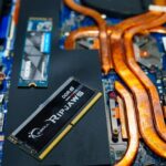 Laptop Buying Guide for 2026: person comparing CPU, RAM, SSD, and GPU settings on screen without overspending, Pexels
