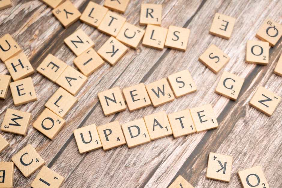 Latest Tech News Breakdown: a tech news desk scene with screen alerts showing important updates for users.