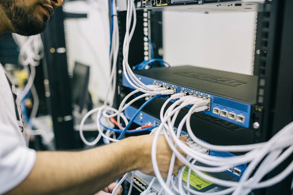 Person configuring Wi-Fi router security settings for isolated IoT devices