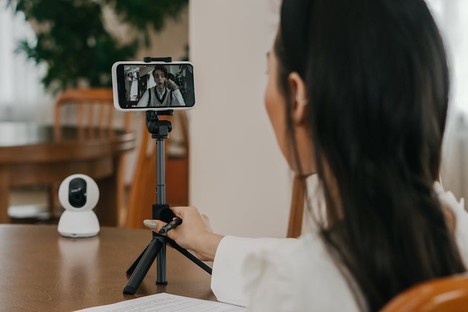 Person on a video call with low-latency quality on a laptop