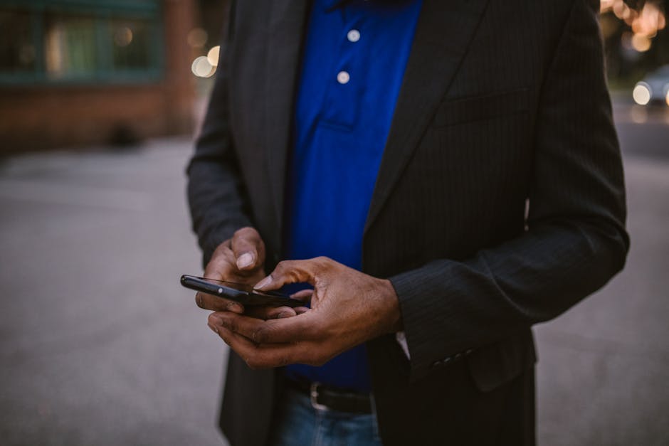 Person checking passkey or sign-in prompt on a smartphone browser