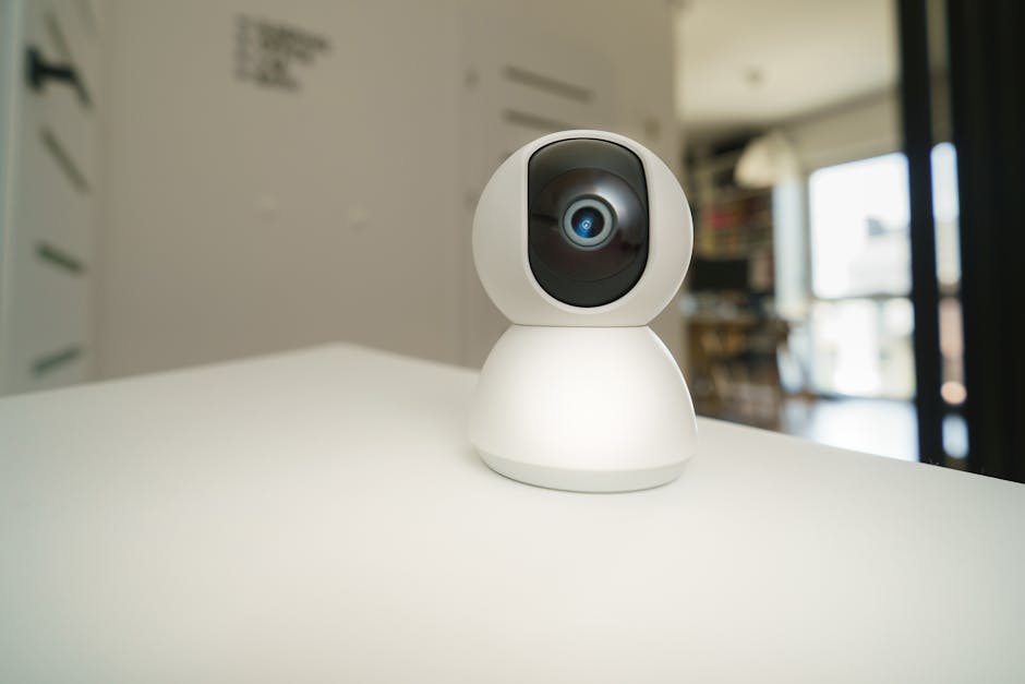 Smart home camera mounted indoors showing privacy and recording controls