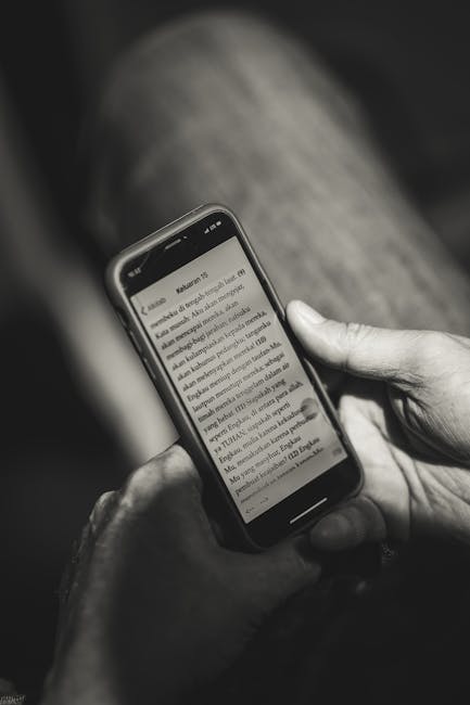 Smartphone showing captions during real-time translation in a noisy setting