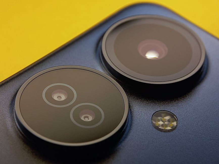 Top Smartphone Camera Upgrades That Actually Matter: a smartphone camera module on a clean tabletop, sensor and lens focus