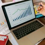 Best Budget Laptops for 2026: 10 picks shown on desk with laptop, notebook, and everyday work essentials.