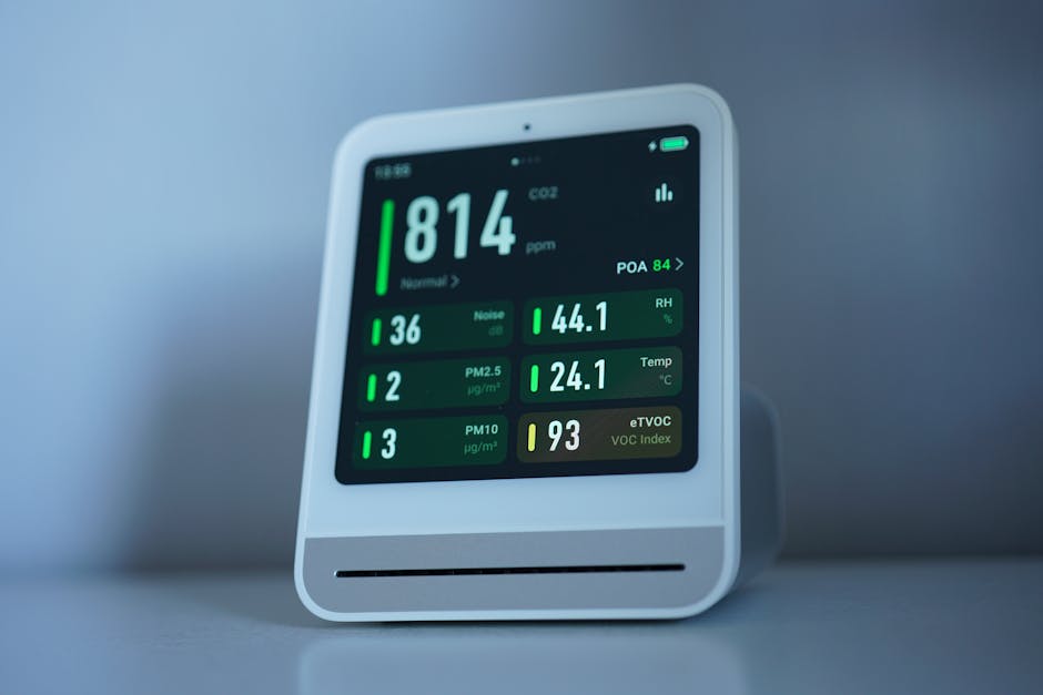 Home air quality monitor screen showing shifting PM2.5 and VOC readings during daily activities