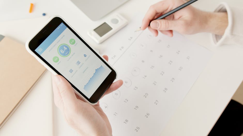 Person using a smartphone to review smartwatch emergency settings