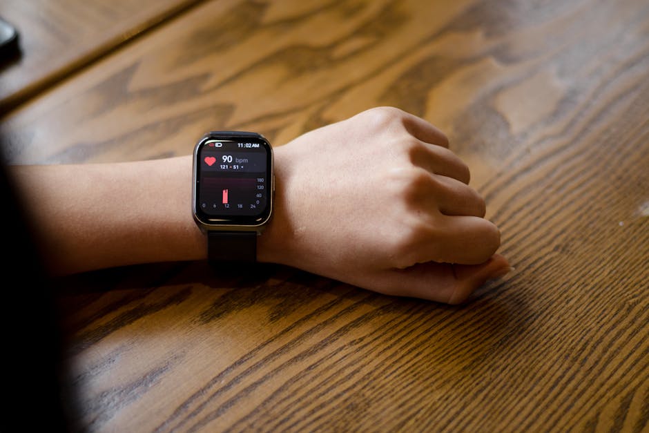 Person wearing smartwatch while walking, showing heart rate sensor setup and motion context